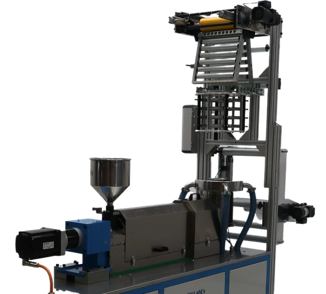Close view of the LabEx 25-1 mono-layer extruder, die head and blown film tower