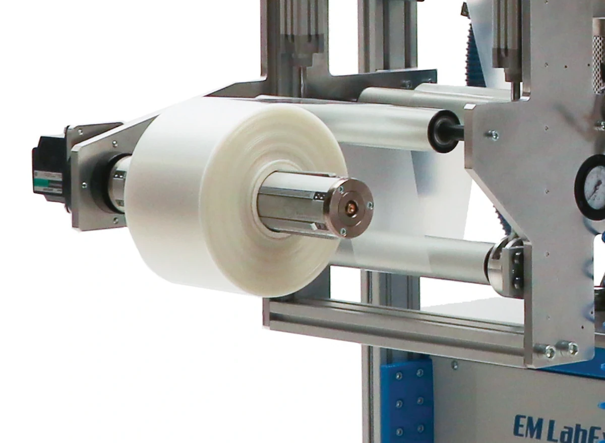 LabEx 25-3 laboratory blown film winder with air-expanding shaft and finished film roll