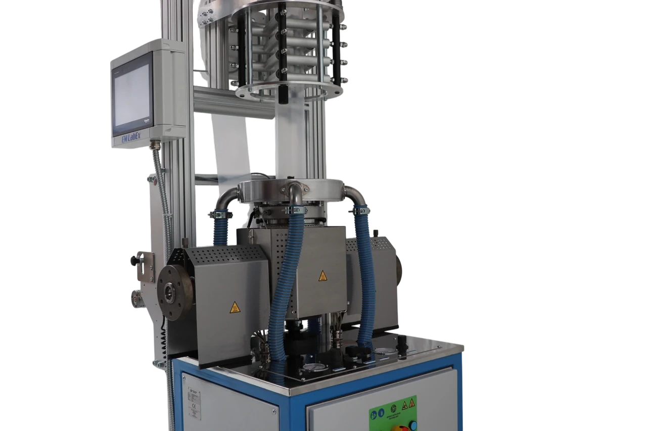 Front view of the LabEx ABA die head, air ring, film bubble and tower
