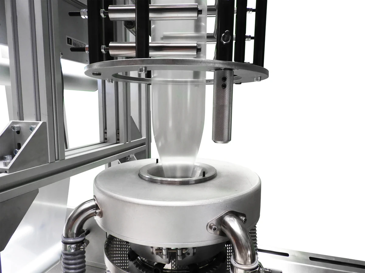 LabEx air ring and calibrating basket stabilising a laboratory blown film bubble