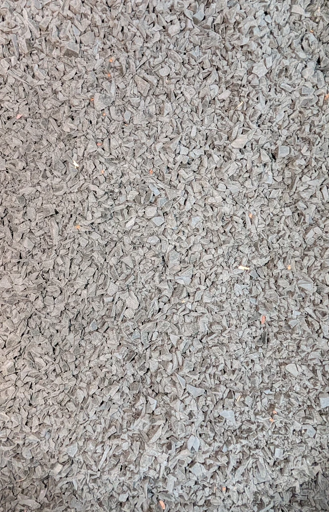 Grey rigid plastic regrind from the GRAN 1 granulator