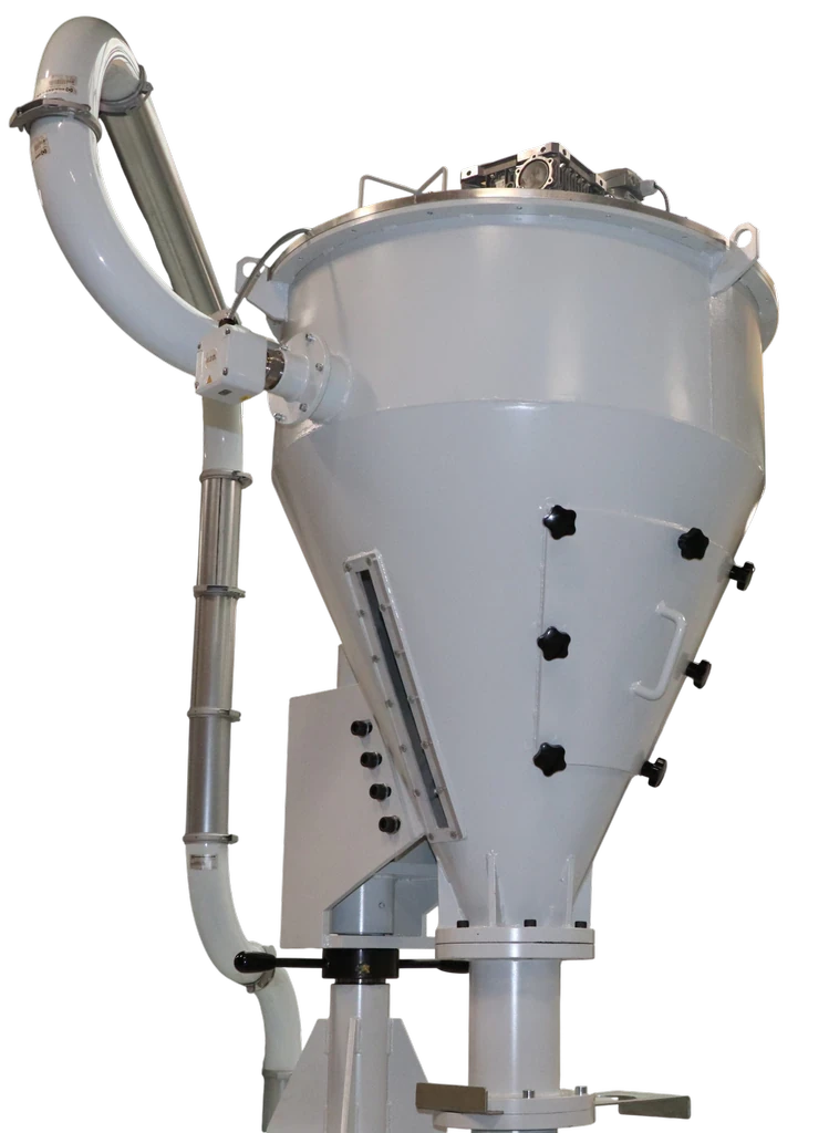 Press feeder for flakes and granulated rigid materials