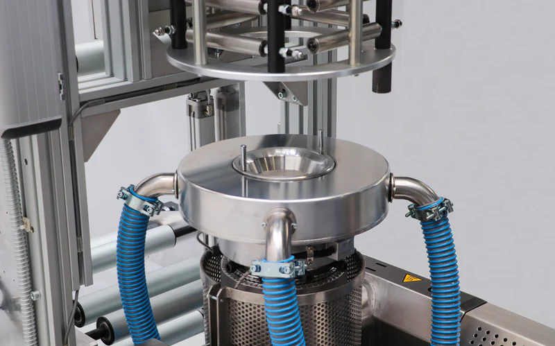 Air ring cooling the blown film bubble on a laboratory line