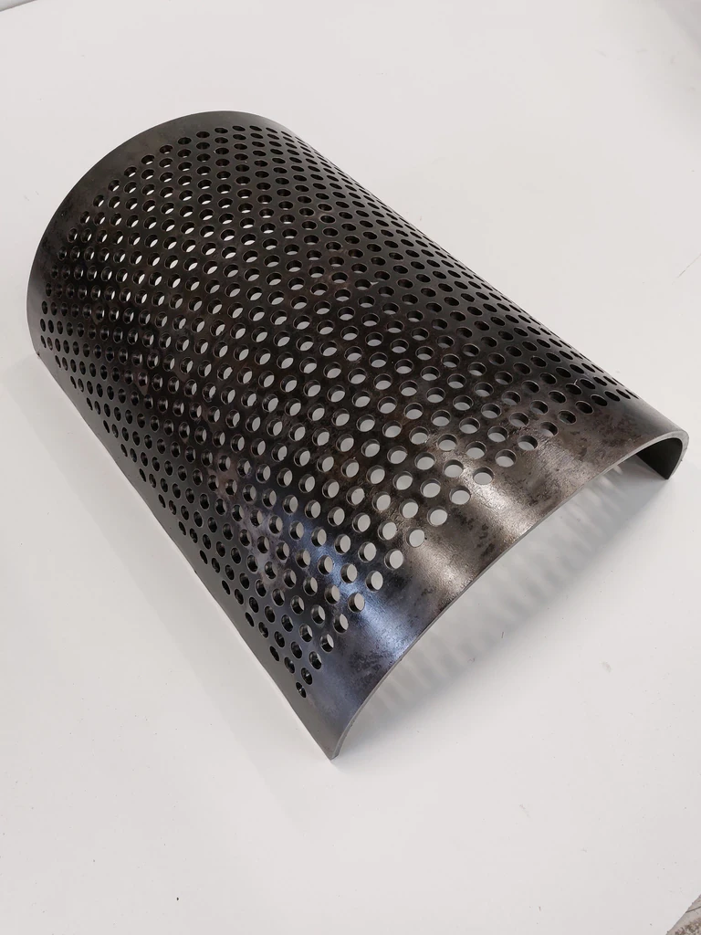 Curved perforated screen for a plastic granulator