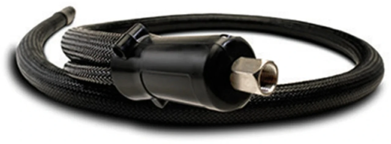 Heated transfer hose for plastics processing equipment