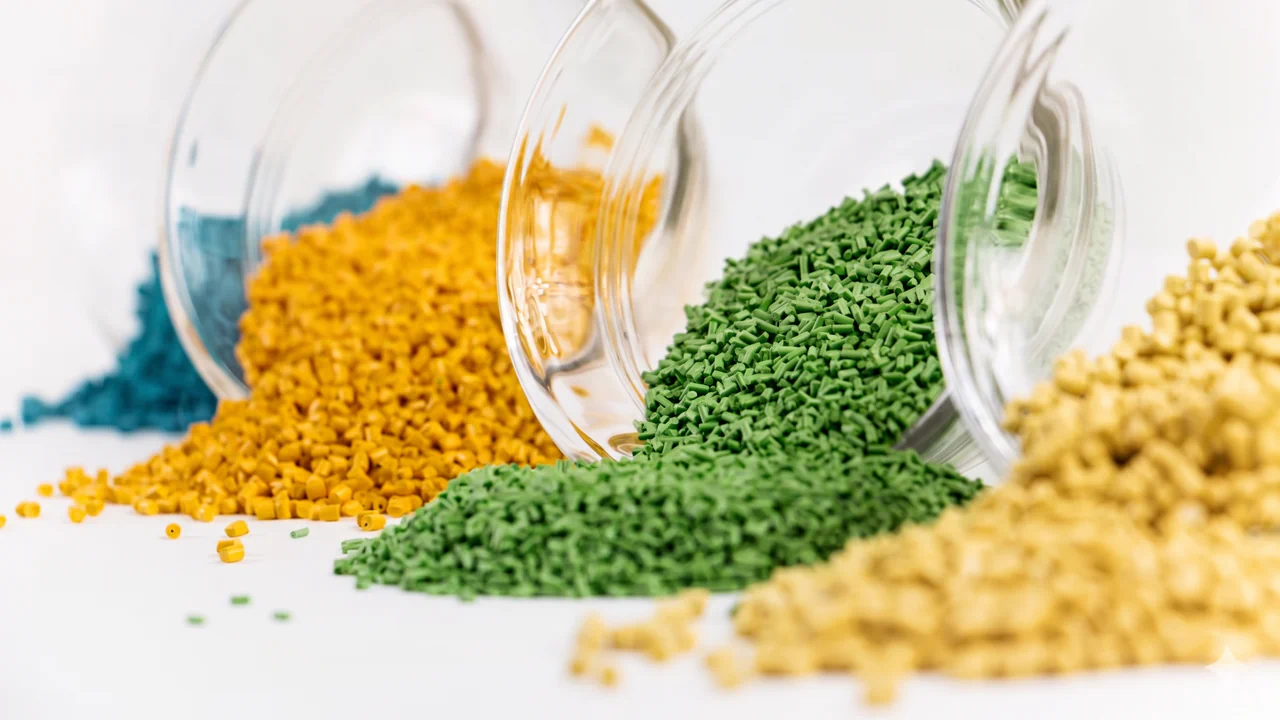 Polymer pellets representing standard plastics, recycled materials and biopolymers