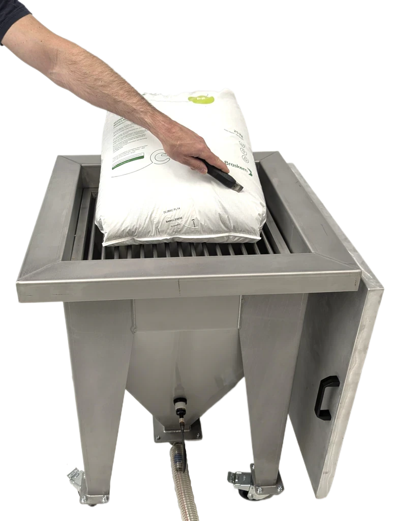 Rip and tip material feeding station for opening polymer bags
