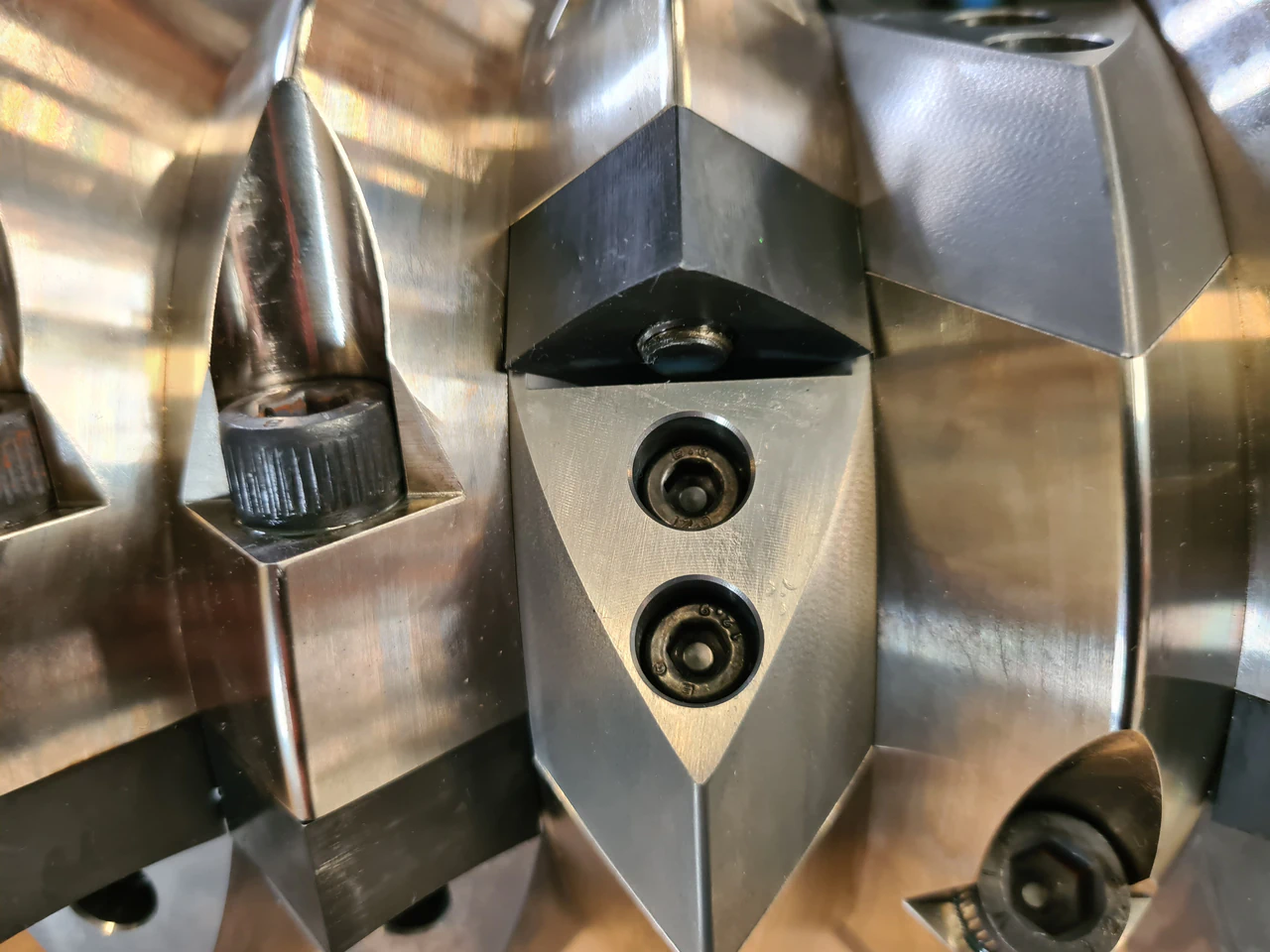 Close-up of knives fitted to a shredder or granulator rotor